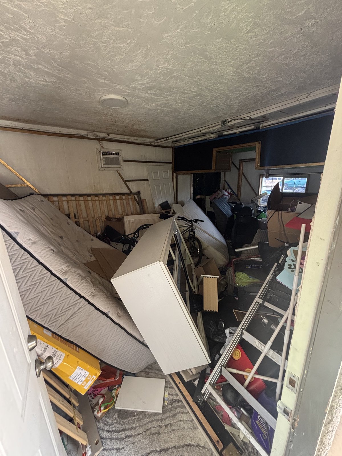 Cluttered space before junk removal
