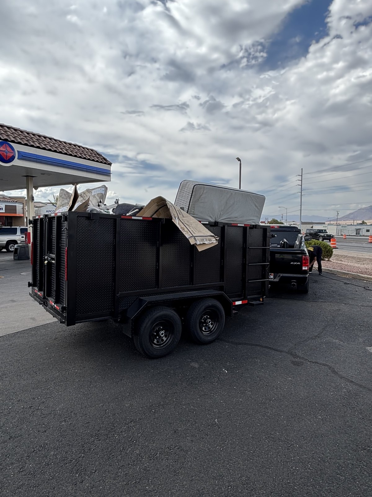 Trailer loaded with household junk